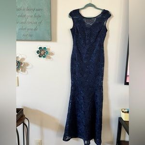Beautiful Mermaid Style dress. Used only once for a wedding. Great condition.